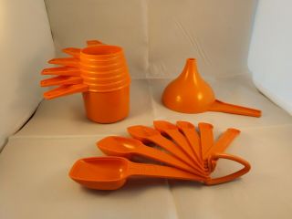 Vintage Tupperware Burnt Orange Stacking Measuring Cups (6) Spoons (7) Funnel (1)