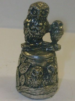 A Pewter Owls Thimble Decorated Around The Edge With Owls