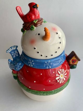 Ceramic Snowman Cookie Jar With The Red Cardinal In Its Nest On Top Of Its Head