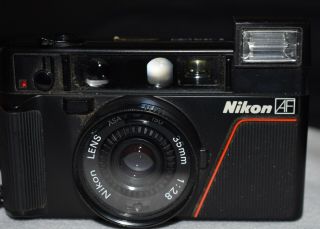 Vintage Nikon L35af 35mm Point & Shoot Film Camera Strap Haze Lens Attachment