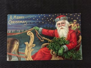Vintage Santa Postcard - A Merry Christmas - Santa In Sleigh -