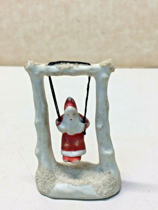 Vintage Old Snowbaby Santa Swinging On A Swing