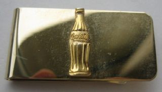 Bright Gold Colored Coca Cola Money Clip With Raised Embossed Bottle