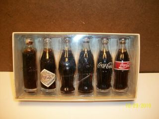 1998 Coca - Cola - The Evolution Of The Contour Mini Bottle Set - Real Liquid.  Nib