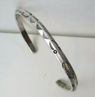 Vintage Navajo Sterling Silver Hand Stamped Carinated Cuff Bracelet Many Symbols