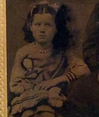 Tintype of girl holding a china head doll ca 1860 - 70 ' s 2