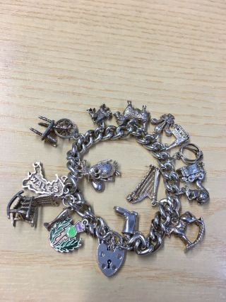 Vintage Solid Sterling Silver Charm Bracelet With 17 Charms.  62 Grams