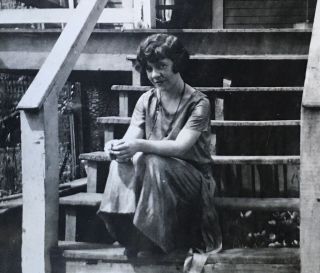 1910’s Pretty Lass Young Lady Poses On Front Steps Vintage Snapshot Photo