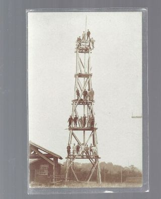 Oil Fields Derreck 21 Men Standing On The Rig Guns Gold Rppc Real Photo Card