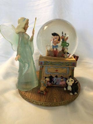 Retired Walt Disney Pinocchio With Blue Fairy Musical Snowglobe