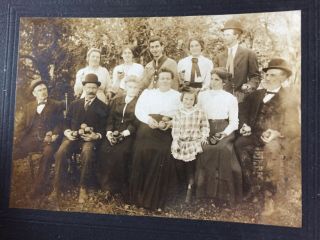 Vintage Old Photo Of A Family Portrait In A Apple Orchard All Holding Apples