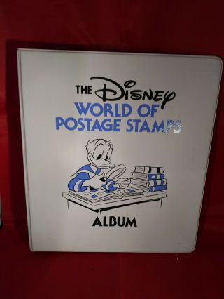 The Disney World Of Postage Stamps Album With 99 Stamps.