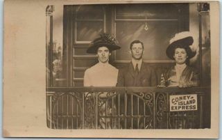 1910s Coney Island York Rppc Studio Photo Postcard Man & 2 Women On Caboose