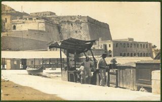 Malta C1920s.  Maltese Men & Boat With Fort St Angelo In Background.  Real Photo.