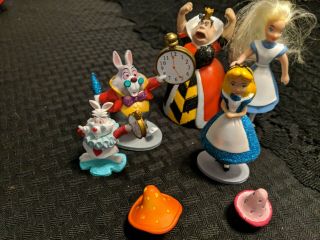 5 PVC figurines from Disney ' s Alice in Wonderland,  Queen,  2 Rabbits,  Mushrooms 2