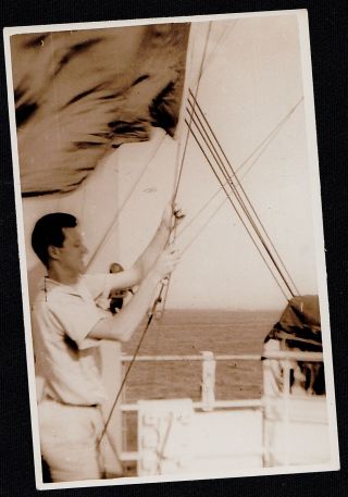 Old Vintage Antique Photograph Man Raising Flag In Boat