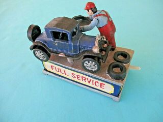 Old Mechanical Cast Iron Coin Bank Old Car & Mechanic " Full Service "