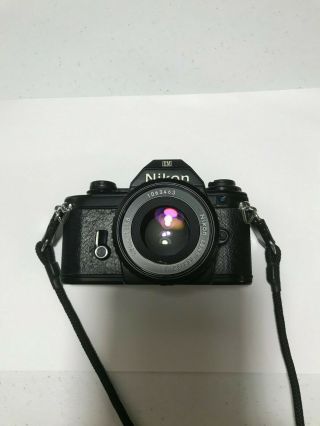 Nikon Em 35mm Vintage Camera With Nikon Series E 1:1.  8 50mm Lens And Case