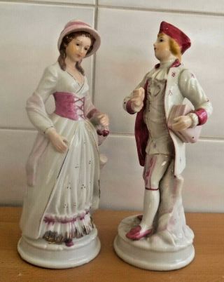 Porcelain Pink And White Lady & Man In 18th Century Dress.  23cms
