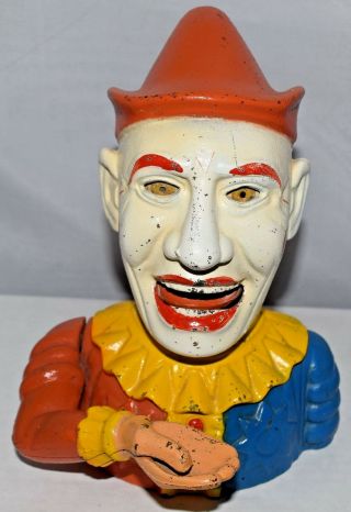 The Book Of Knowledge Clown Mechanical Coin Bank Cast Iron Clown