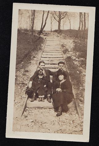Vintage Antique Photograph Two Men & Woman With Child Sitting On Train Tracks