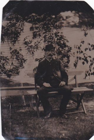 Victorian Era Tintype Photo Of Rough Man W/ Mustache Sitting On Bench Outside