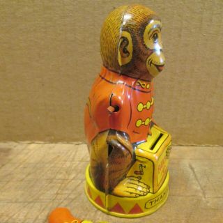 1930s J CHEIN - ORGAN GRINDER MONKEY COIN BANK,  Tin Litho,  Complete 2