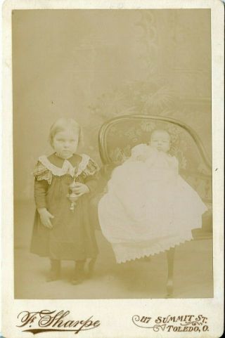 Antique Photograph On Card Of Toddler & Baby Girls With Toy Toledo Ohio