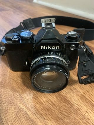 Nikon Fm Vintage 35mm Slr Camera W/ 50mm E Series Lens And Spectrum 7 Filter