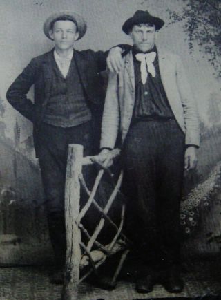 Antique Tintype Photo Of 2 Young Men Wearing Hats Standing By The Garden Gate