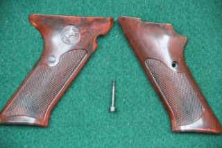 Vintage Colt Woodsman.  22 Pistol Bakelite Grips