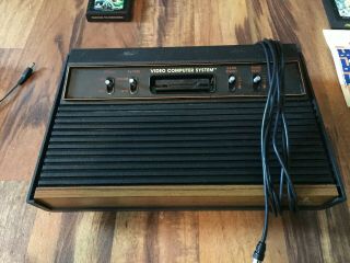 ATARI CX - 2600 VIDEO COMPUTER SYSTEM WITH JOYSTICKS,  GAMES,  AND MANUALS vintage 3