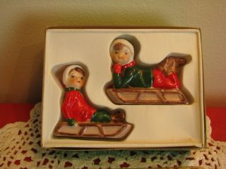 Vintage Set Of Porcelain Ceramic Boy And Girl On Sleds Winter Christmas