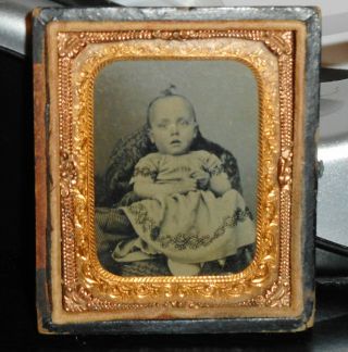 Tintype Mourning Photo Of Child In Gold Metal Frame With Brown