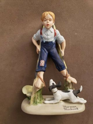 The 12 Norman Rockwell Porcelain Figurines " Boy On Stilts " (1980)