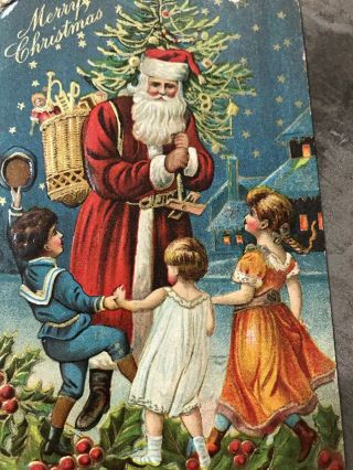 Antique Christmas Postcard Embossed Santa Claus Children Dancing 1908 Posted (k)