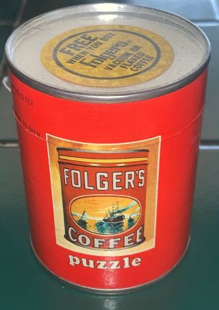 VINTAGE FOLGERS COFFEE PUZZLE IN CARDBOARD CAN 3.  5” 2