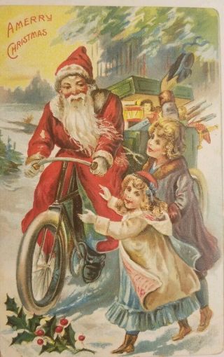 Vintage C1909 Postcard Santa On A Tricycle W/a Trunkload Of Toys And Kids Waving