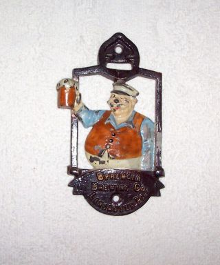 F - 406 Beer Drinker,  Sprenhger Brew.  Cast Iron,  Figural Wall Mount Bottle Opener