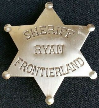 Frontierland Sheriff Ryan.  Vintage Tin Pinback Badge From Disneyland.