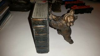 Vintage Bear Holding Up A Book Bronze Bookend