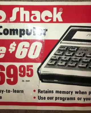 Adv.  “RADIO SHACK - Pocket Computer TRS - 80” sign;early ‘80’s;GOOD;22” x 60”;color 3