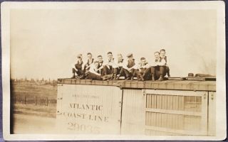 Real Photo Postcard Rppc Ten Men On Top Of Atlantic Coastline Railroad Boxcar