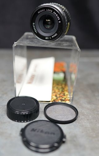 Vintage Nikon Series E 28mm F2.  8 Camera Lens For F Mount W/ Caps & Filter