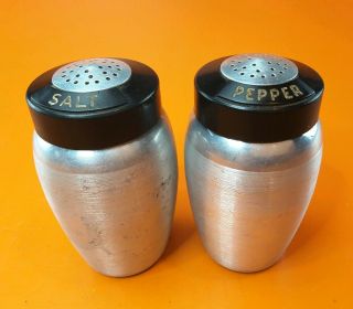 Vintage Kromex Spun Aluminum Salt And Pepper Shakers With Black Top.