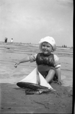 Two Vintage Negatives.  Little Girl Or Boy With Model Yacht At The Seaside.  C1920 
