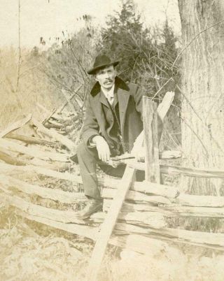 Z816 Vtg Photo Man In Hat Sitting On Split Rail Fence C 1906