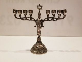 A Silver Hanukkah Menorah.  Germany,  C.  1900.  On Round Base With Floral Design