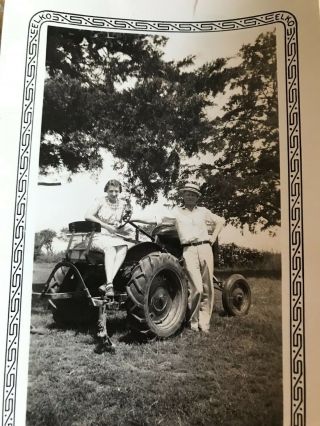 Vintage Photo Man And Woman On Farmall Cub Tractor