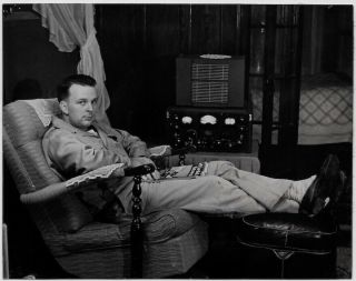 Old Photo Man Sitting In Chair Reading Field And Stream By Shortwave Radio 1950s